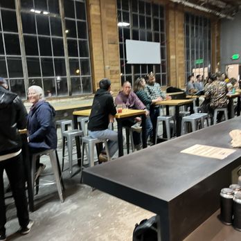 Brix Factory Brewing - a group of people sitting at tables - Breweries Near Me - Oakland, California
