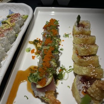 Tsunami Restaurant & Sushi Bar - Left: Executive Suite Roll (1/2 order size) | Right: Sunshine Roll (1/2 order size) - Sushi Bars Near Me - Lehi, Utah Tsunami Restaurant & Sushi Bar - Left: Executive Suite Roll (1/2 order size) | Right: Sunshine Roll (1/2 order size) - Sushi Bars Near Me - Lehi, Utah