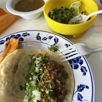 Tacos El Rinconcito - Carnitas taco with onions and cilantro so you can add your own. - Mexican Near Me - Watauga, Texas