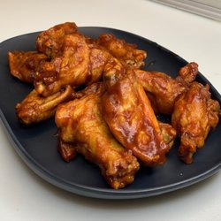 Bites & Brews - Bone-In Traditional Wings, pictured with BBQ Sauce