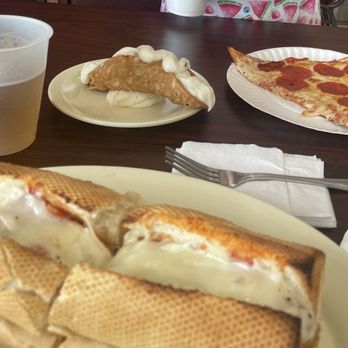 Brooklyn Pizzeria - Slice of pepperoni, cannoli, chicken parmigiana hero. - Pizza Near Me - Missouri City, Texas