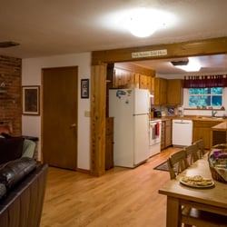 A Cozy River House - A Cozy River House II (Cozy 2) kitchen and dining open to the living area.
