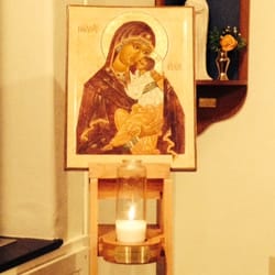 All Saints Episcopal Church - Holy Mary mother of God with a candle in the side chapel.