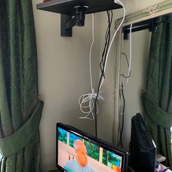 Hamilton House - TVs barely worked and this was one of the "upgraded" ones...too bad they couldn't bother mounting it up properly.