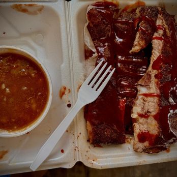 Big Daddy Que - Half slab of 6 big ribs (with a fork just for scale b/c I'm off plastic) and their amazing baked beans! There are lots of other sides! - Barbeque Near Me - Reynoldsburg, Ohio