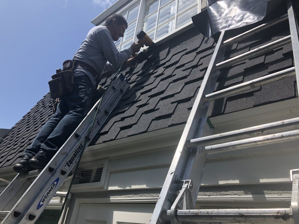 Slide of Michiel Roofing