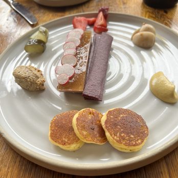 Husk Savannah - Chicken liver pate, honey, elderflower, Bellini's, pickles, corn crackers, mustard - Southern Near Me - Savannah, Georgia Husk Savannah - Chicken liver pate, honey, elderflower, Bellini's, pickles, corn crackers, mustard - Southern Near Me - Savannah, Georgia