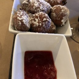 Zeppoles with Carmel sauce and a berry sauce Zeppoles with Carmel sauce and a berry sauce
