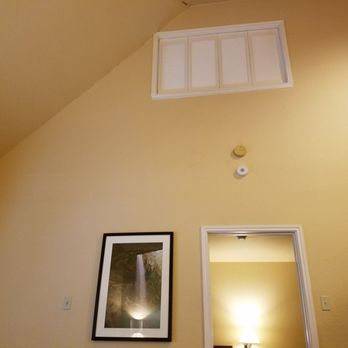 Habitat Suites - Looking up from living room to bedroom 2 window w/folding shutters - Hotels Near Me - Austin, Texas Habitat Suites - Looking up from living room to bedroom 2 window w/folding shutters - Hotels Near Me - Austin, Texas