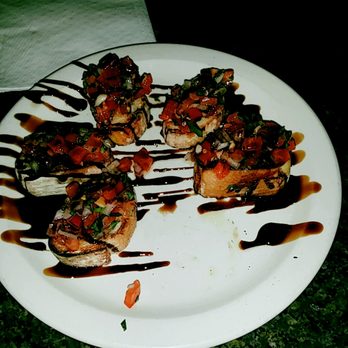 Genovese's Italian Cafe - Lovely bruschetta Had to try one before I photographed it. - Italian Near Me - Ormond Beach, Florida Genovese's Italian Cafe - Lovely bruschetta Had to try one before I photographed it. - Italian Near Me - Ormond Beach, Florida