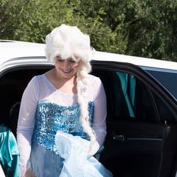 Prestige Limousine Service - Princess Elsa, from Something Enchanted Princess Parties, arriving at the Sparkle! Concert.