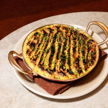 Markette - Braised Oxtail Gratin with crispy cheddar polenta - Modern European Near Me - New York, New York Markette - Braised Oxtail Gratin with crispy cheddar polenta - Modern European Near Me - New York, New York