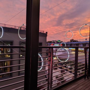 Officina - Upstairs outdoor patio view sunset - Italian Near Me - Washington, DC, District of Columbia Officina - Upstairs outdoor patio view sunset - Italian Near Me - Washington, DC, District of Columbia