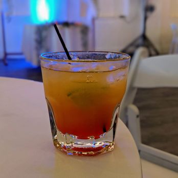 Chef's Table Catering - "First Sunset" cocktail. Orange juice, rum, grenadine, lime slice. - Caterers Near Me - Philadelphia, Pennsylvania