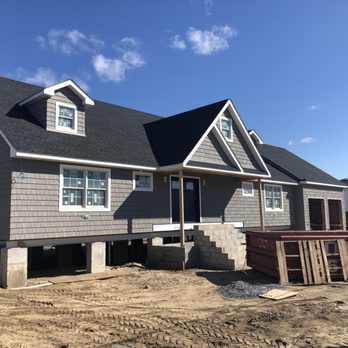 Swanson Construction - GAF 30 year shingles and Certainteed cedar impressions installed on this home in Island Park - Roofing Near Me Swanson Construction - GAF 30 year shingles and Certainteed cedar impressions installed on this home in Island Park - Roofing Near Me