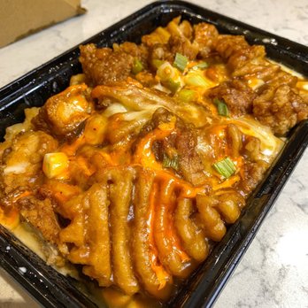 Poutine Boss - a tray of pasta and meat - Fast Food Near Me - Montreal, Quebec