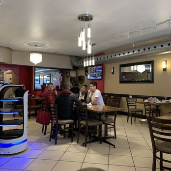 King's Tacos - people sitting at tables in a restaurant - Mexican Near Me - Toronto, Ontario