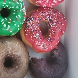 Fresh Donuts - Half eaten Blueberry Donut. Couldn't wait!