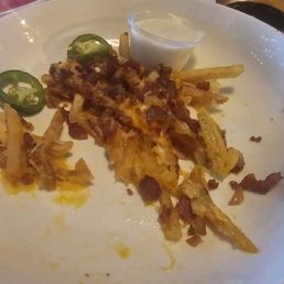 Forgot got the name..loaded fries??? Cheese and bacon on fries...100% delicious! Forgot got the name..loaded fries??? Cheese and bacon on fries...100% delicious!