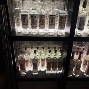 Amano - Only a small wall of their mescal storage room. - Cocktail Bars Near Me - Caldwell, Idaho