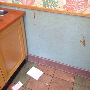 Wendy's - a kitchen with a sink and paper on the floor - Burgers Near Me - Edison, New Jersey