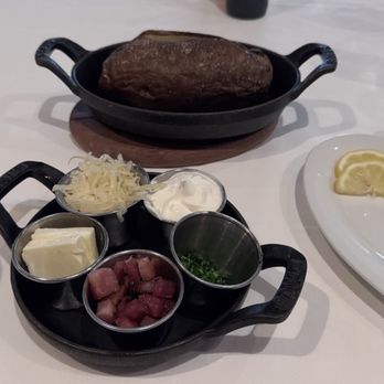Council Oak Steaks and Seafood - Loaded bake potato - Steakhouses Near Me - Wheatland, California Council Oak Steaks and Seafood - Loaded bake potato - Steakhouses Near Me - Wheatland, California