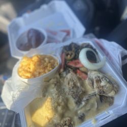Lewis Little This Little That - Baked chicken, dressing and gravy, collards, Mac and cheese and cranberry.