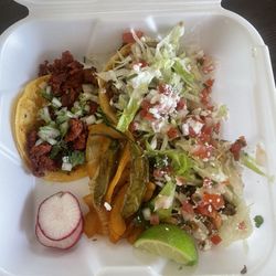Tacos El Semáforo - Two sopes de asada and a taco de chorizo.