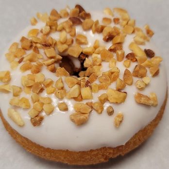 Sunny Donuts - a frosted donut with nuts on top - Donuts Near Me - Long Beach, California Sunny Donuts - a frosted donut with nuts on top - Donuts Near Me - Long Beach, California