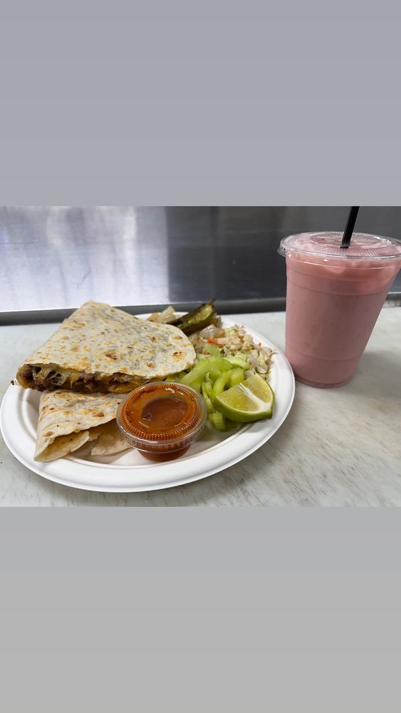 Ceviches y Aguachiles El Monito Logo