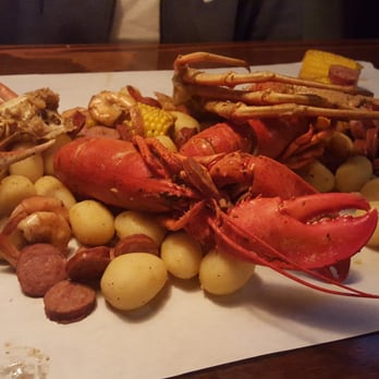 Daisy's Garage - Steam pot with two lobsters!! - New American Near Me - Cedar Rapids, Iowa