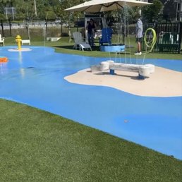 Baxter's Doghouse - Part of the splash pad - Tiki Bars Near Me - Stuart, Florida