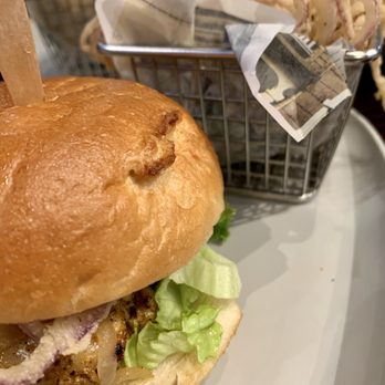 Wahlburgers - Delicious grilled marinated chicken with the best onion rings - Burgers Near Me - St. Charles, Illinois