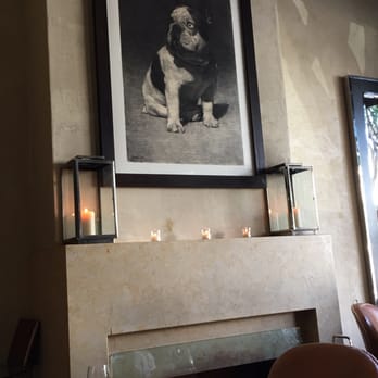 Spruce - fireplace & the owner's French bulldog - American Near Me - San Francisco, California