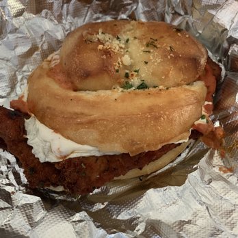 Angela's Pizzeria - Al la vodka chicken sandwich on a large homemade garlic knot with mozzarella cheese - Pizza Near Me - Islip, New York Angela's Pizzeria - Al la vodka chicken sandwich on a large homemade garlic knot with mozzarella cheese - Pizza Near Me - Islip, New York