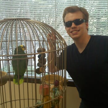 David Weed J, DDS - My brother just got his braces off and decided to pose with Dr. Weed's parrot. - Orthodontists Near Me - Mercer Island, Washington David Weed J, DDS - My brother just got his braces off and decided to pose with Dr. Weed's parrot. - Orthodontists Near Me - Mercer Island, Washington