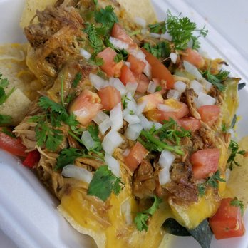 Foodism - Nachos with grilled pork and green salsa - Food Trucks Near Me - Studio City, California Foodism - Nachos with grilled pork and green salsa - Food Trucks Near Me - Studio City, California