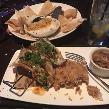 Yard House - Vampire tacos with the lobster, crab, and artichoke dip in the back. - New American Near Me - Indianapolis, Indiana