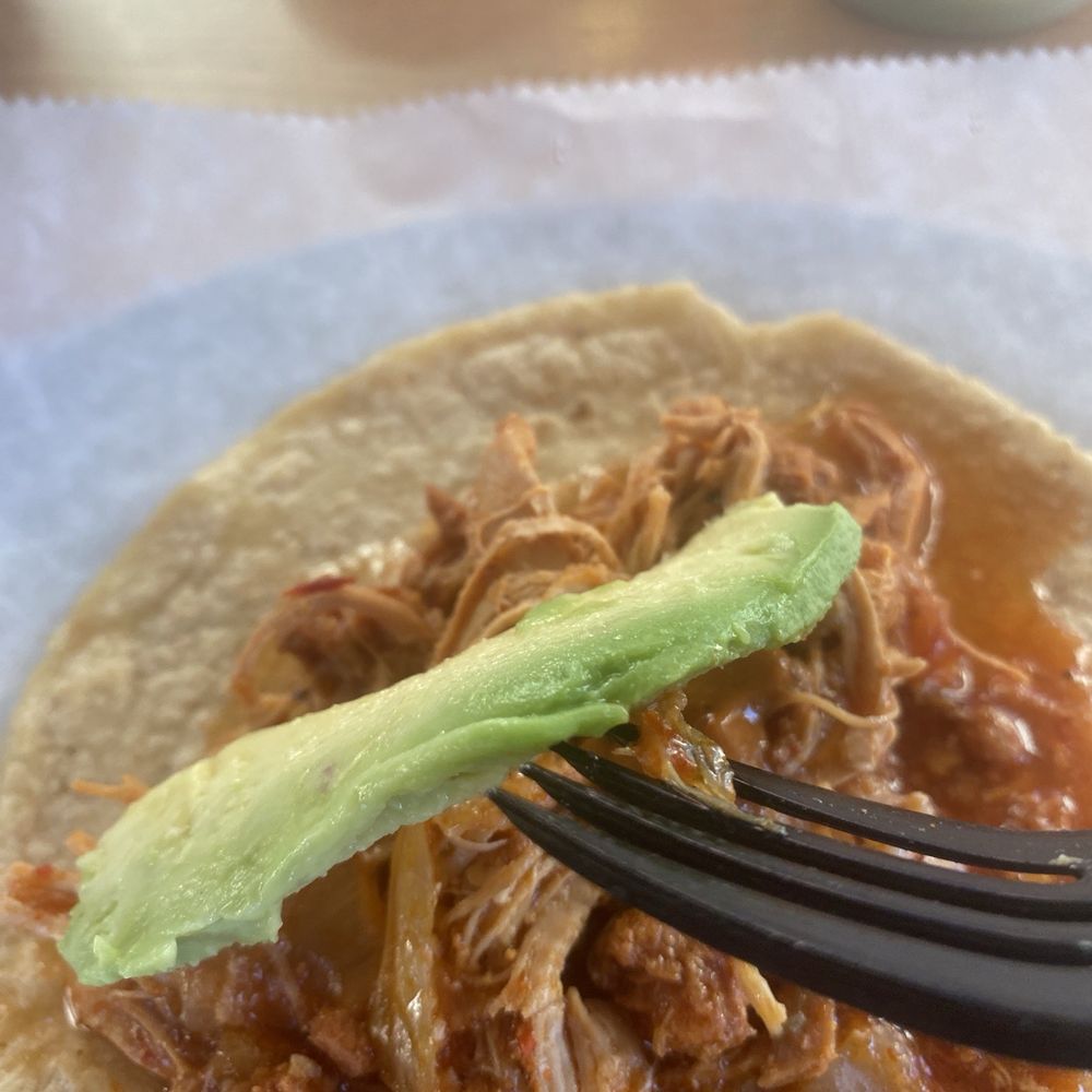 Guisados - Literally a petite slice of avocado on top of Tinga chicken taco. For the price of this taco, there should have been at least 3 slices. - Mexican Near Me - Pasadena, California Guisados - Literally a petite slice of avocado on top of Tinga chicken taco. For the price of this taco, there should have been at least 3 slices. - Mexican Near Me - Pasadena, California