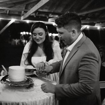 Crafty's Coffee & Gifts - a bride and groom cutting their wedding cake - Coffee & Tea Near Me - Panora, Iowa Crafty's Coffee & Gifts - a bride and groom cutting their wedding cake - Coffee & Tea Near Me - Panora, Iowa