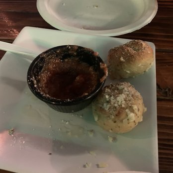 Antics Pizza - Last two garlic knots, we ate the other 4.  Very good and very garlicky. - Pizza Near Me - Hilo, Hawaii