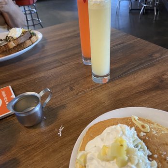 Slappy Cakes - Pineapple pancakes, strawberry mimosa? The fruity one and the Maui mimosa. Also got the mushroom scrabble. - Breakfast & Brunch Near Me - Lahaina, Hawaii