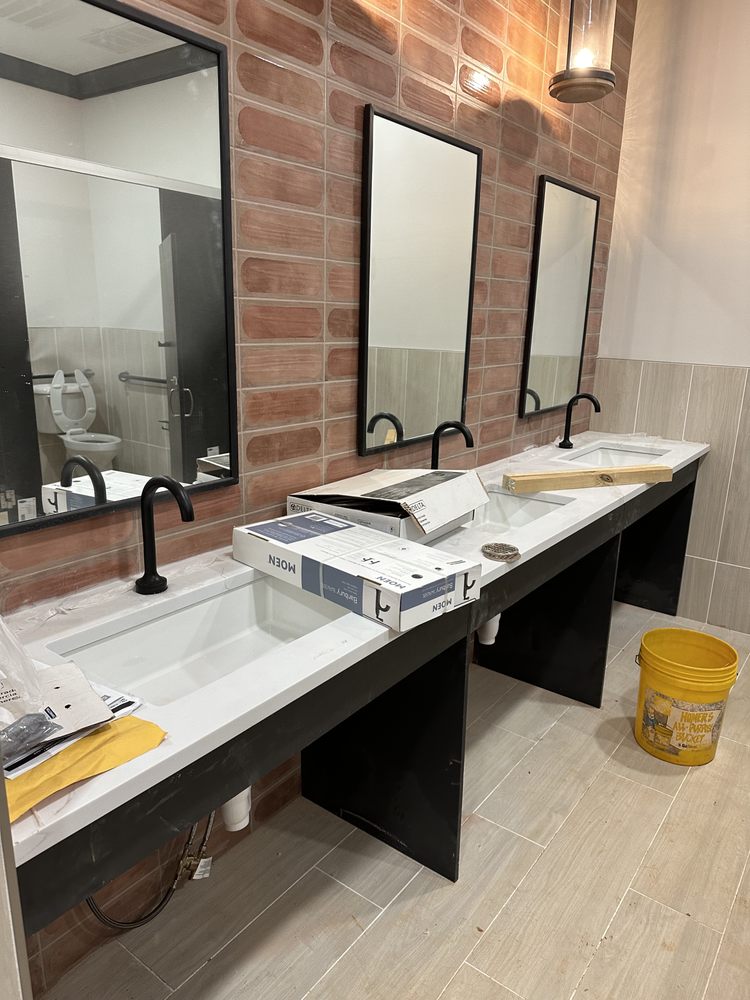 Slide of SJA Plumbing and Services