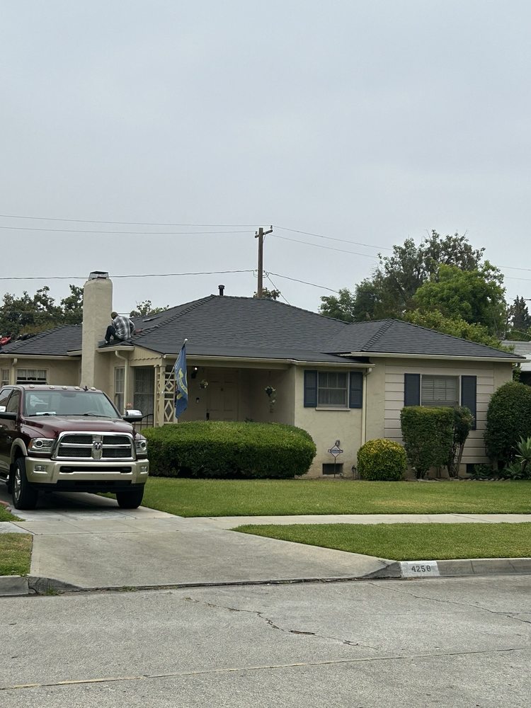 Slide of Manna Roofing Company