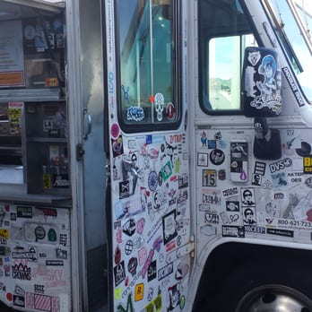 Kogi BBQ Truck - Side view of truck - Korean Near Me Kogi BBQ Truck - Side view of truck - Korean Near Me