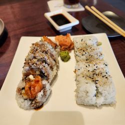 The Sushi Bar - (Left) is the renegade roll (Right) is the Philadelphia roll Both very tasty and fresh Love how fluffy the rice is as well