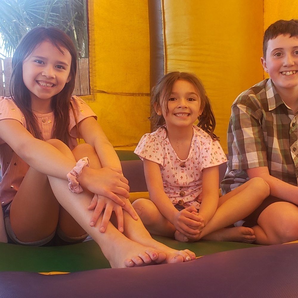 Budget Bouncers Party Rentals - Four happy kids in their jumper - Bounce House Rentals Near Me - Upland, California Budget Bouncers Party Rentals - Four happy kids in their jumper - Bounce House Rentals Near Me - Upland, California
