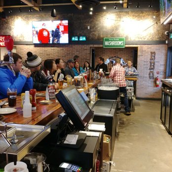 Montana's BBQ & Bar - customers sitting at the bar - Steakhouses Near Me - Sydney, Nova Scotia Montana's BBQ & Bar - customers sitting at the bar - Steakhouses Near Me - Sydney, Nova Scotia