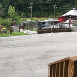 Hidden Hollow Park - Jungle gym and animal cages.