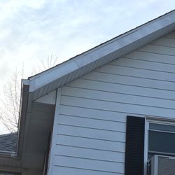 Poplar Roofing & Construction - Squirrel hole in flashing & buckled shingles fixed!